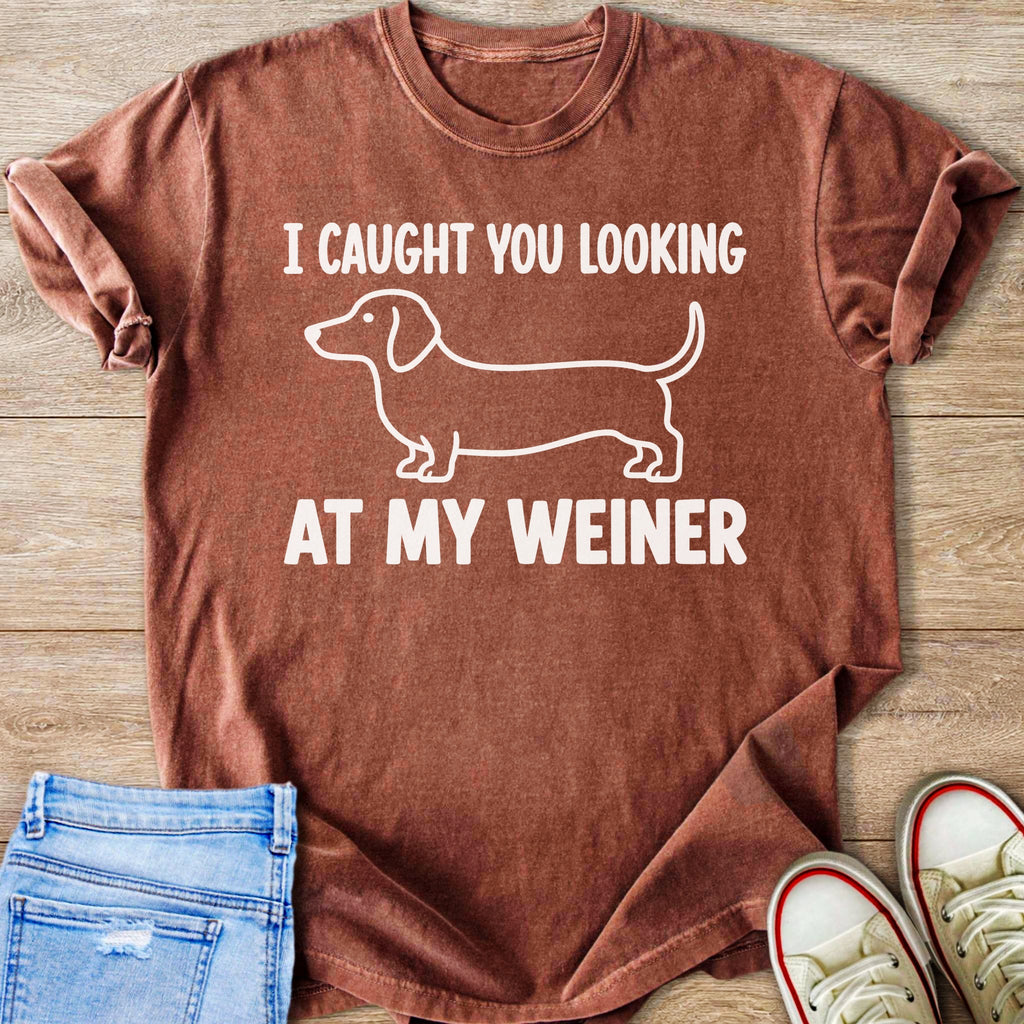 Brown t-shirt with white dachshund graphic and text "I CAUGHT YOU LOOKING AT MY WEINER".
