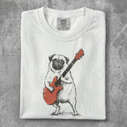 White t-shirt with a pug playing a red electric guitar.