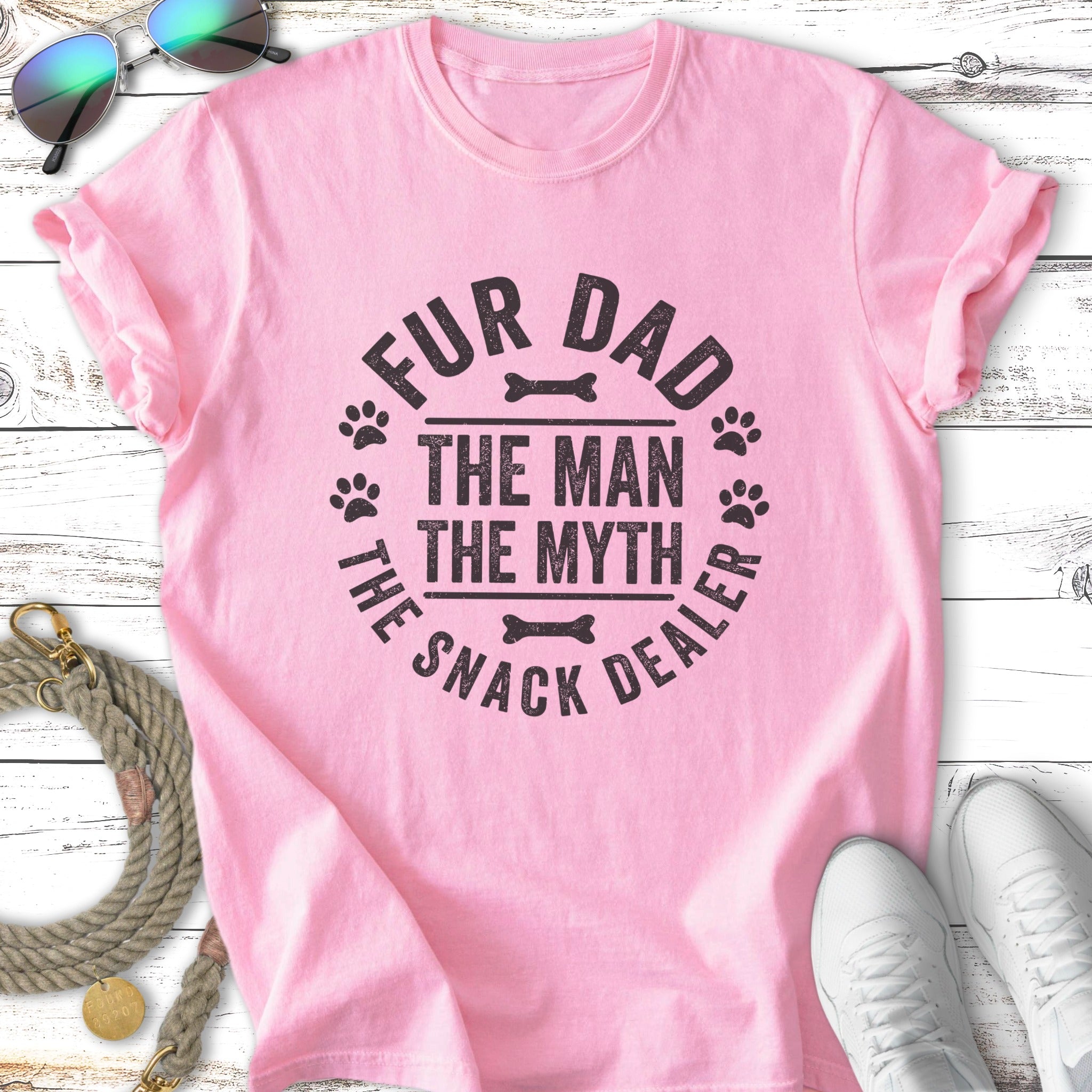 Pink t-shirt with "Fur Dad The Man The Myth The Snack Dealer" text and paw prints.