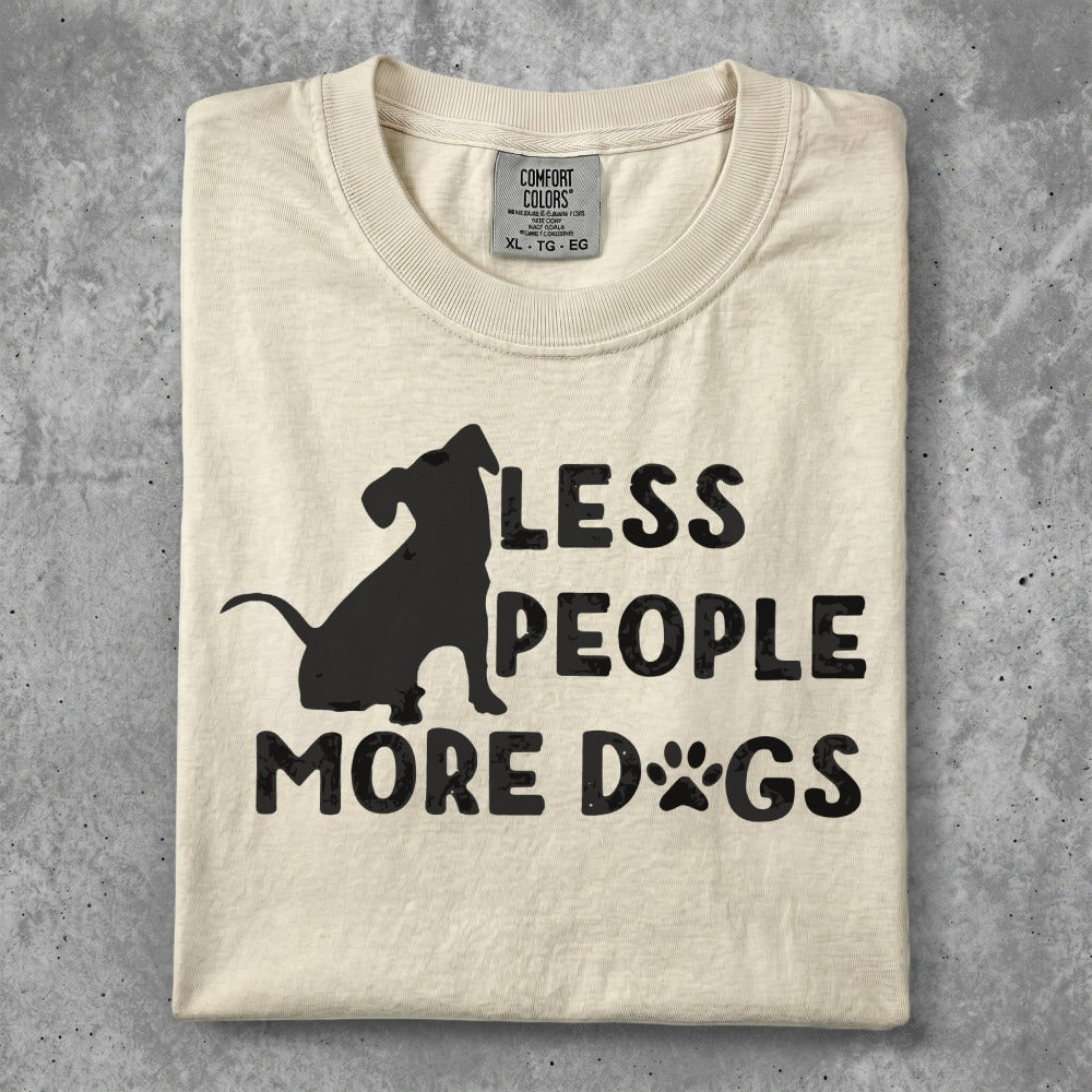 Cream t-shirt with black silhouette of dog and text "LESS PEOPLE MORE DOGS".