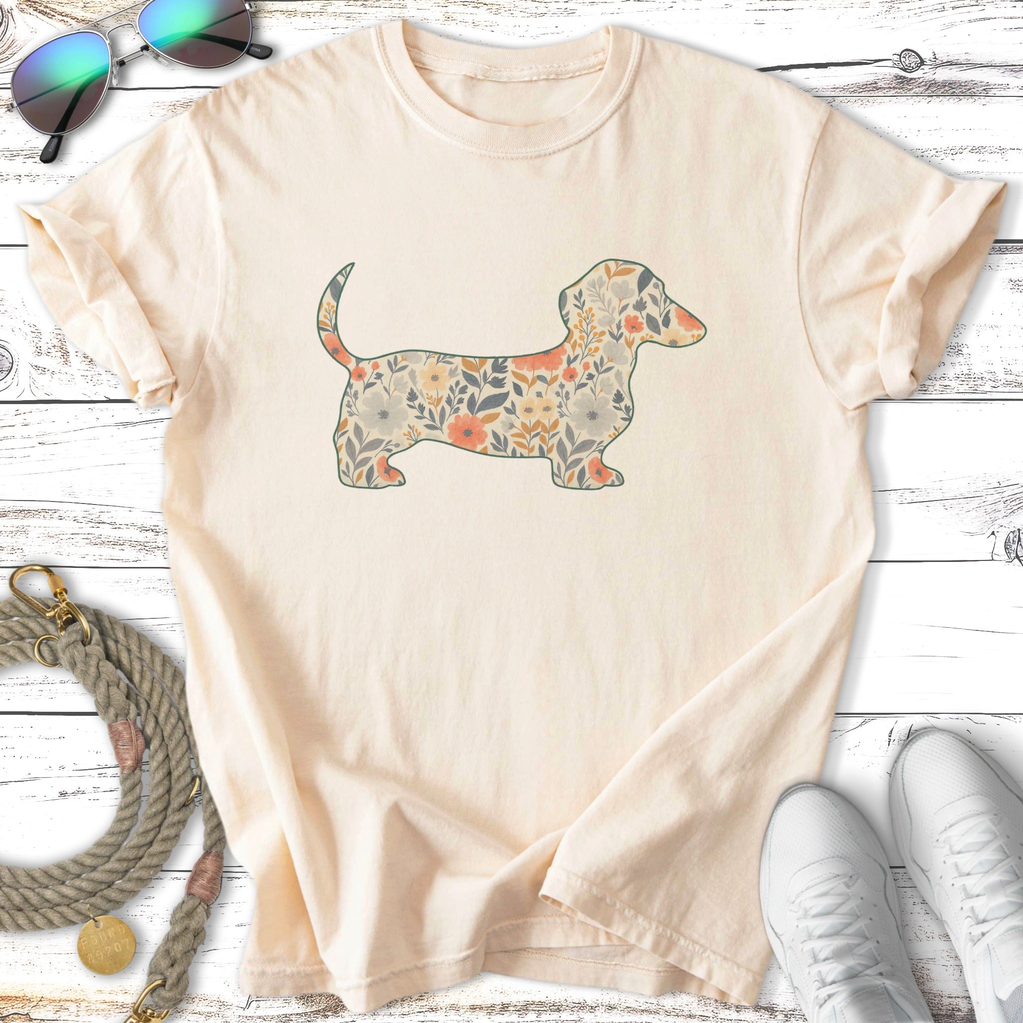 Cream t-shirt with a floral dachshund silhouette.
