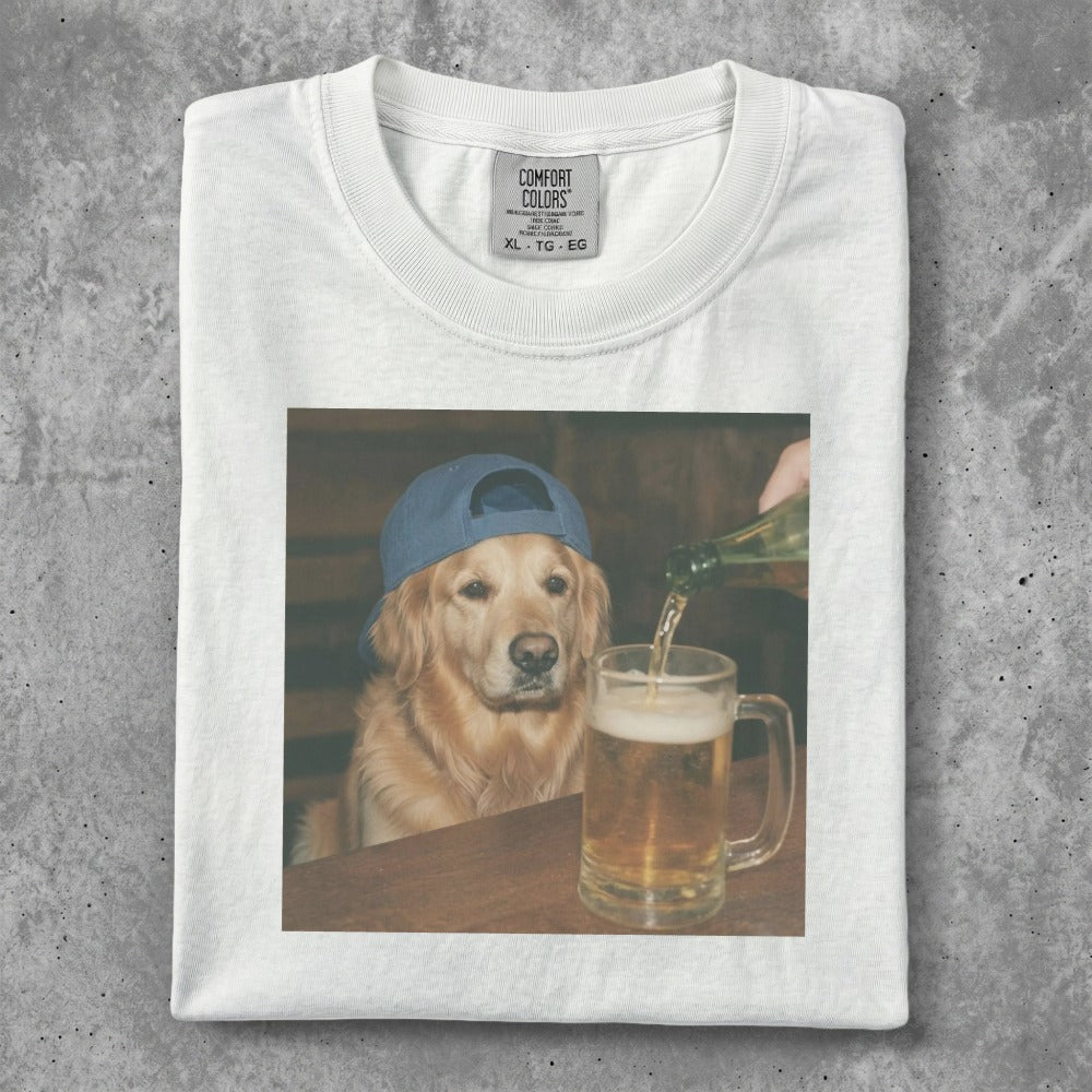Golden retriever wearing a blue hat drinks beer from a mug.