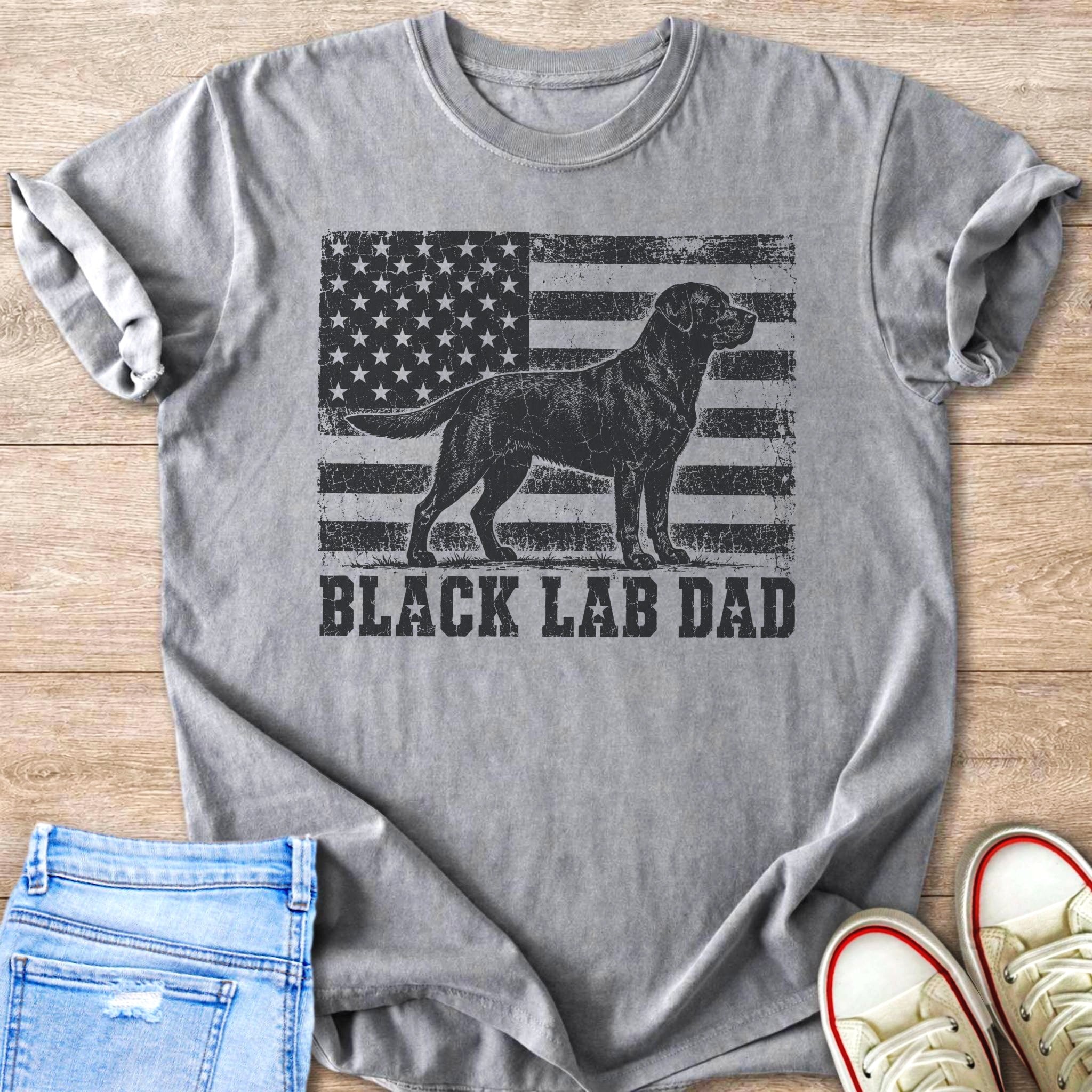 Grey t-shirt with black lab silhouette in front of distressed American flag and "BLACK LAB DAD" text.