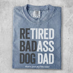 Comfort Colors t-shirt with "RETIRED BADASS DOG DAD" text.