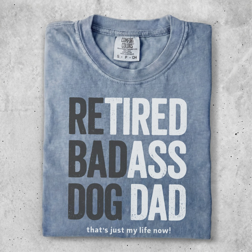 Comfort Colors t-shirt with "RETIRED BADASS DOG DAD" text.