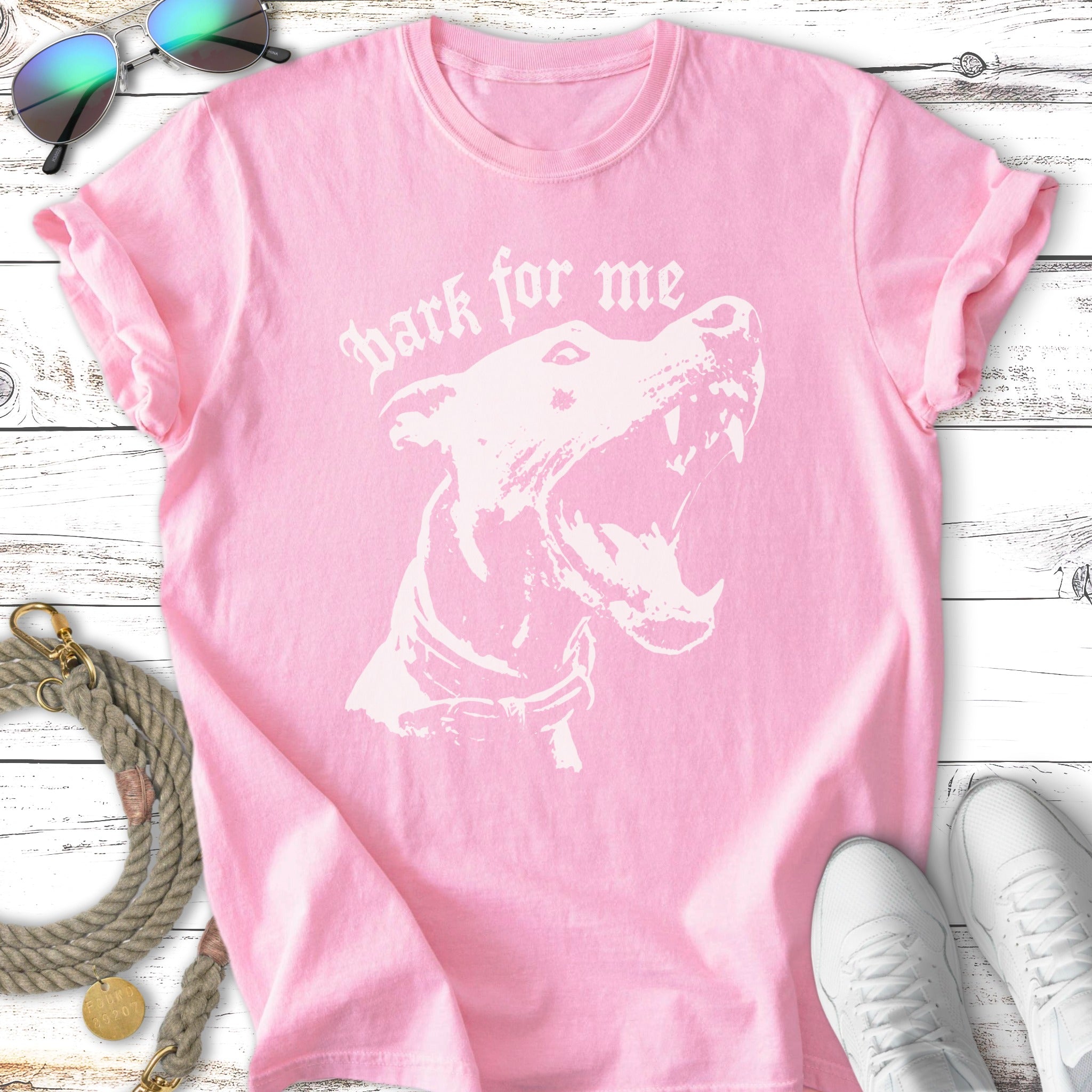 Pink t-shirt with white graphic of a snarling dog and text "bark for me."