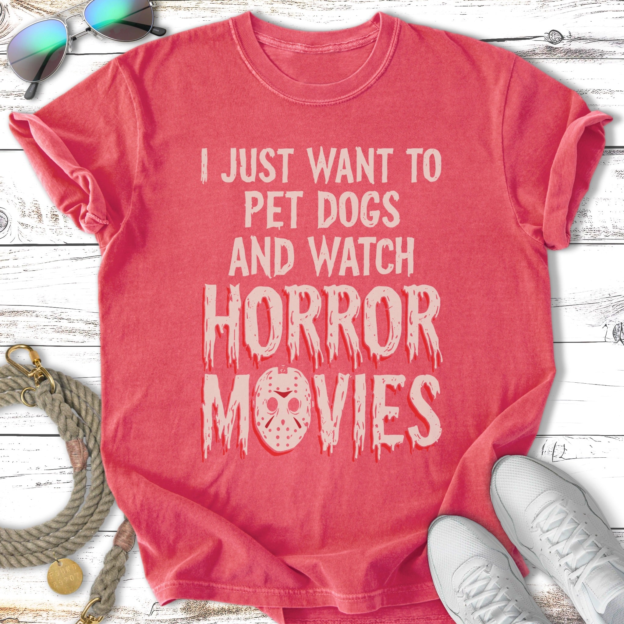 Crimson t-shirt with "I just want to pet dogs and watch horror movies" and a horror mask.