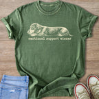 Green t-shirt with a sketch of a dachshund and text "emotional support wiener".