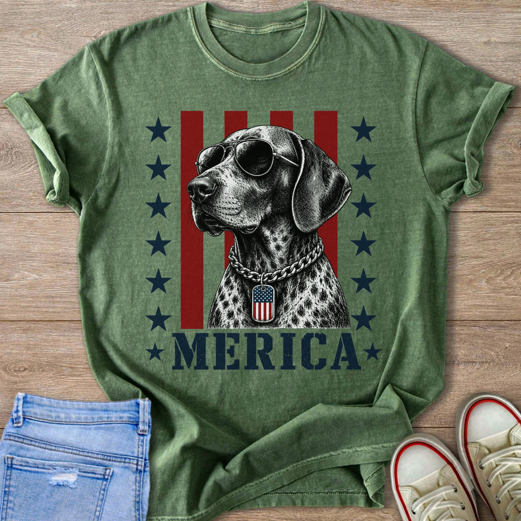 Green shirt with a dog wearing sunglasses and an American flag tag, text "MERICA".