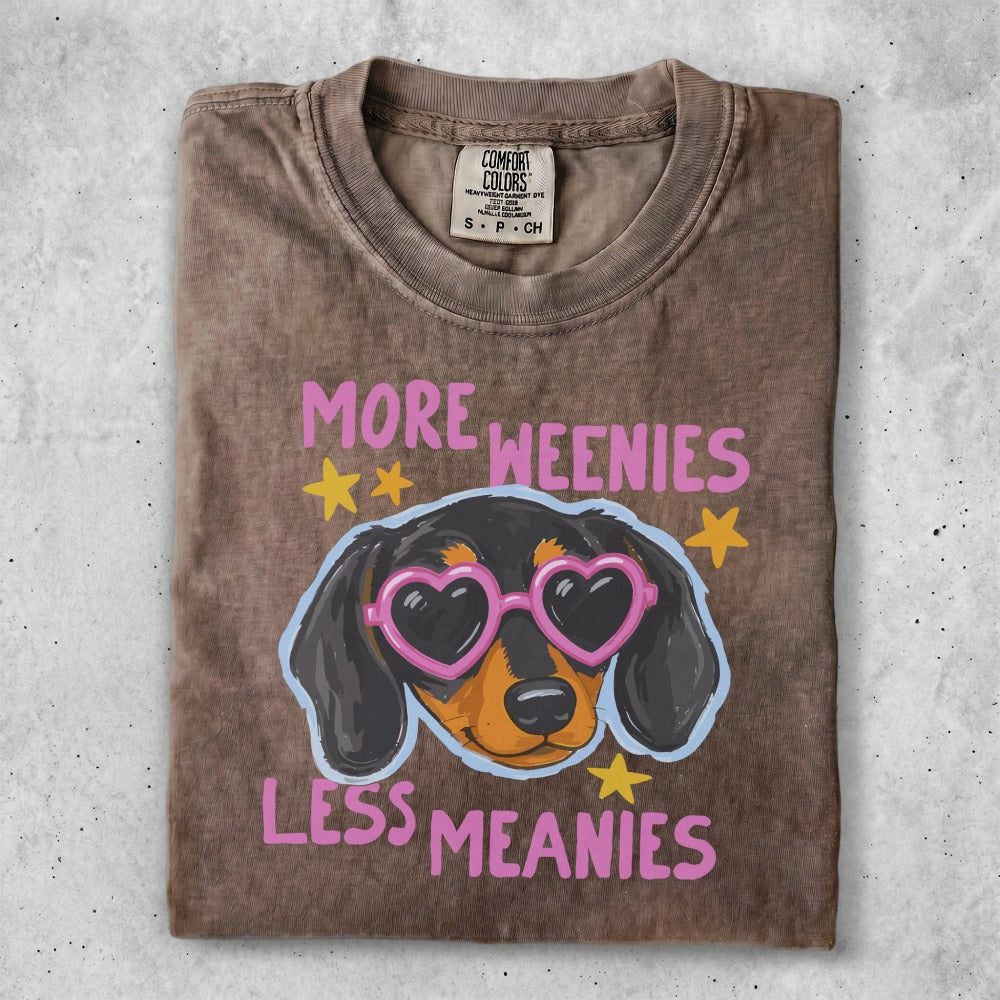 Brown t-shirt with "More Weenies Less Meanies" and a dachshund wearing heart sunglasses.