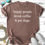 Brown t-shirt with "happy people drink coffee & pet dogs." text.