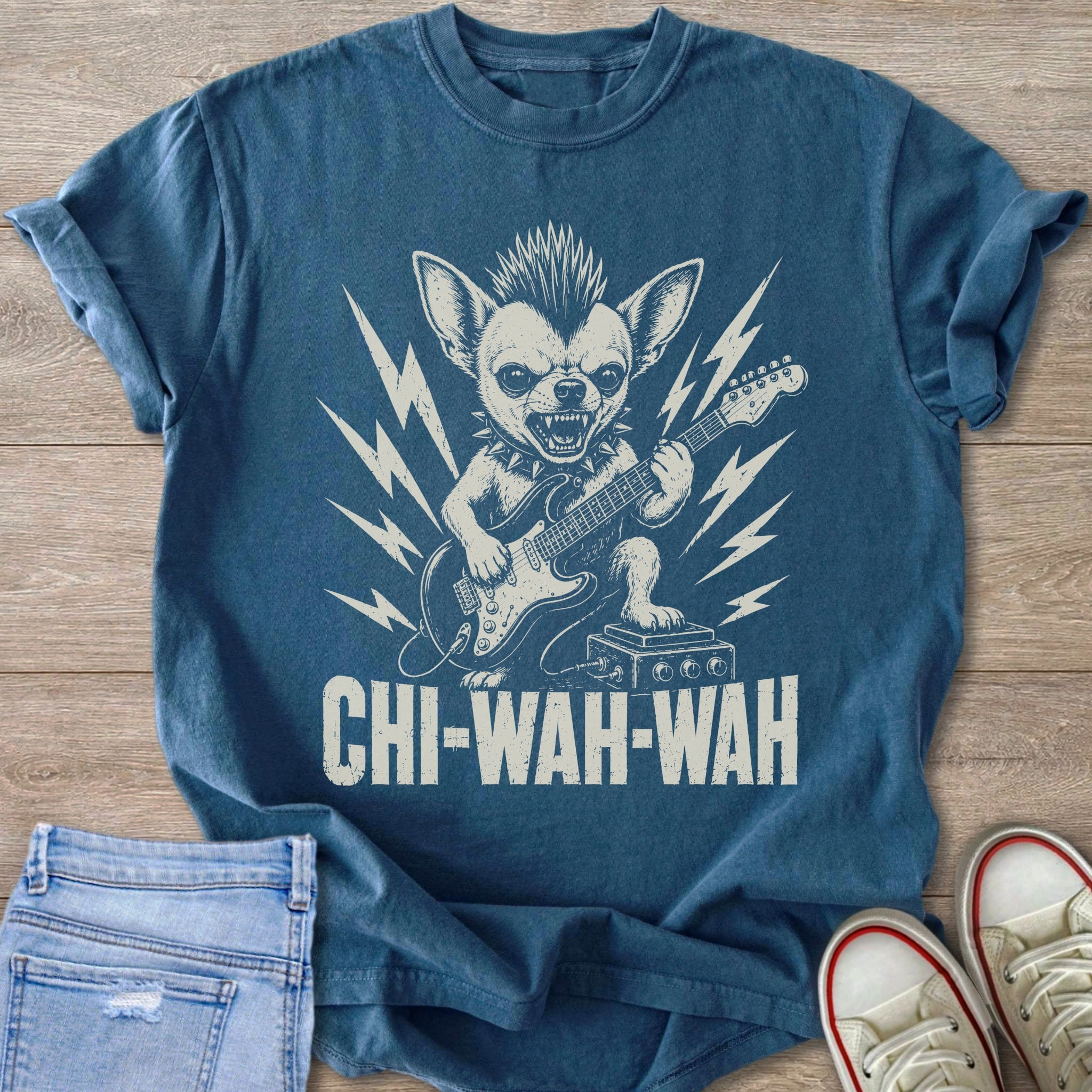 Chihuahua with mohawk and spikes playing guitar, text CHI-WAH-WAH.