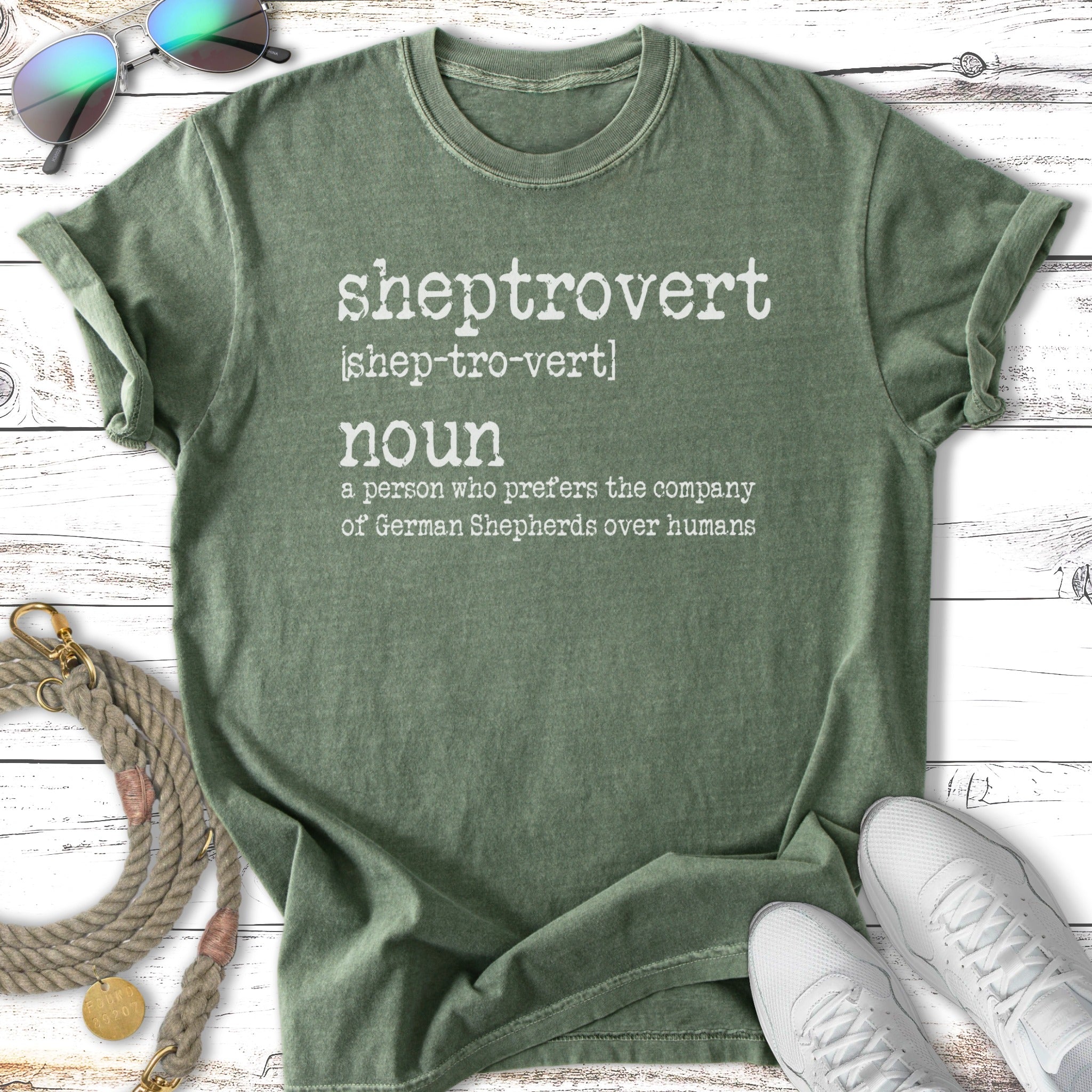 Green t-shirt with "sheptrovert" definition in white text.