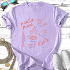 Lavender t-shirt with hand-drawn pasta shapes and "Pasta Pups" text.