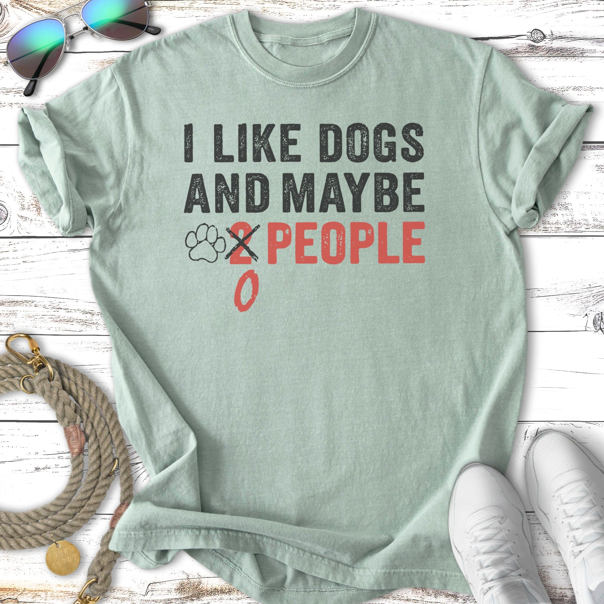 Light green t-shirt with "I LIKE DOGS and maybe 0 people" text.