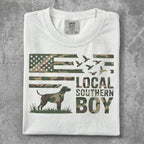 White t-shirt with camouflage US flag, dog, and text "LOCAL SOUTHERN BOY."