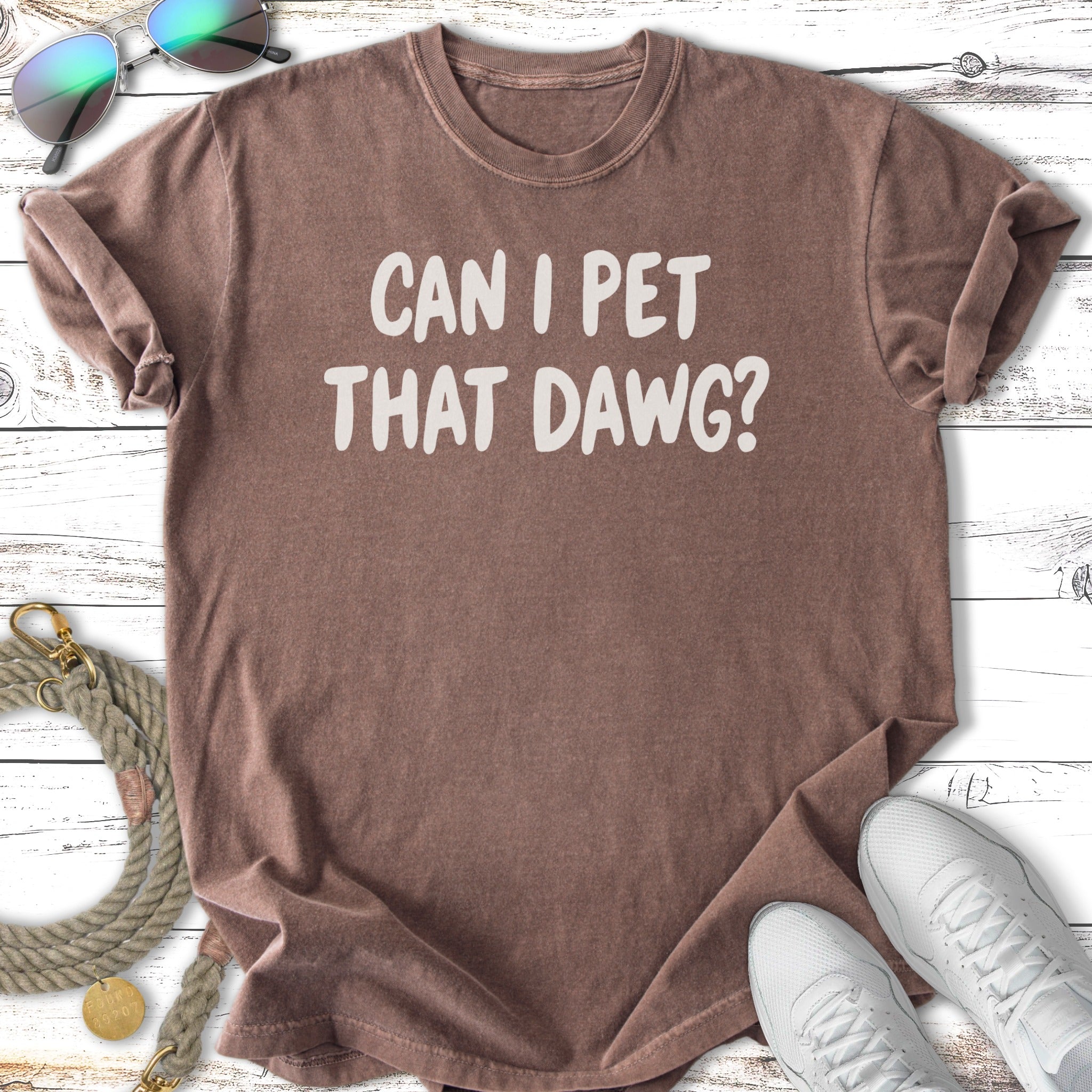 Brown t-shirt with "CAN I PET THAT DAWG?" text.