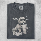 T-shirt with graphic of a dog in sunglasses drinking an iced coffee.