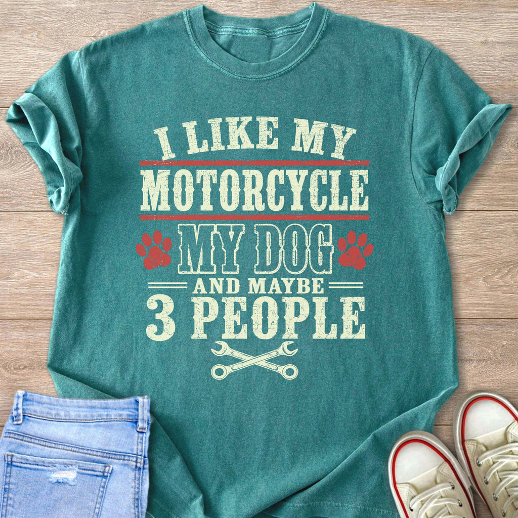 Teal t-shirt with text "I like my motorcycle, my dog, and maybe 3 people."