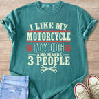 Teal t-shirt with text "I like my motorcycle, my dog, and maybe 3 people."
