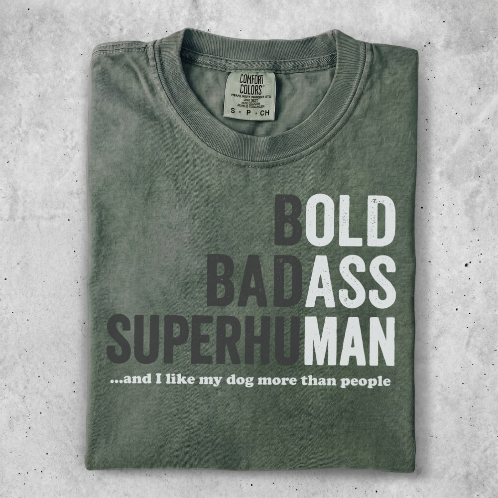 Green t-shirt with text "BOLD BADASS SUPERHUMAN ...and I like my dog more than people".