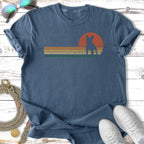 T-shirt with vintage sunset graphic of a French bulldog silhouette.