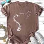 Brown t-shirt with a white outline graphic of a dog's head and leash.