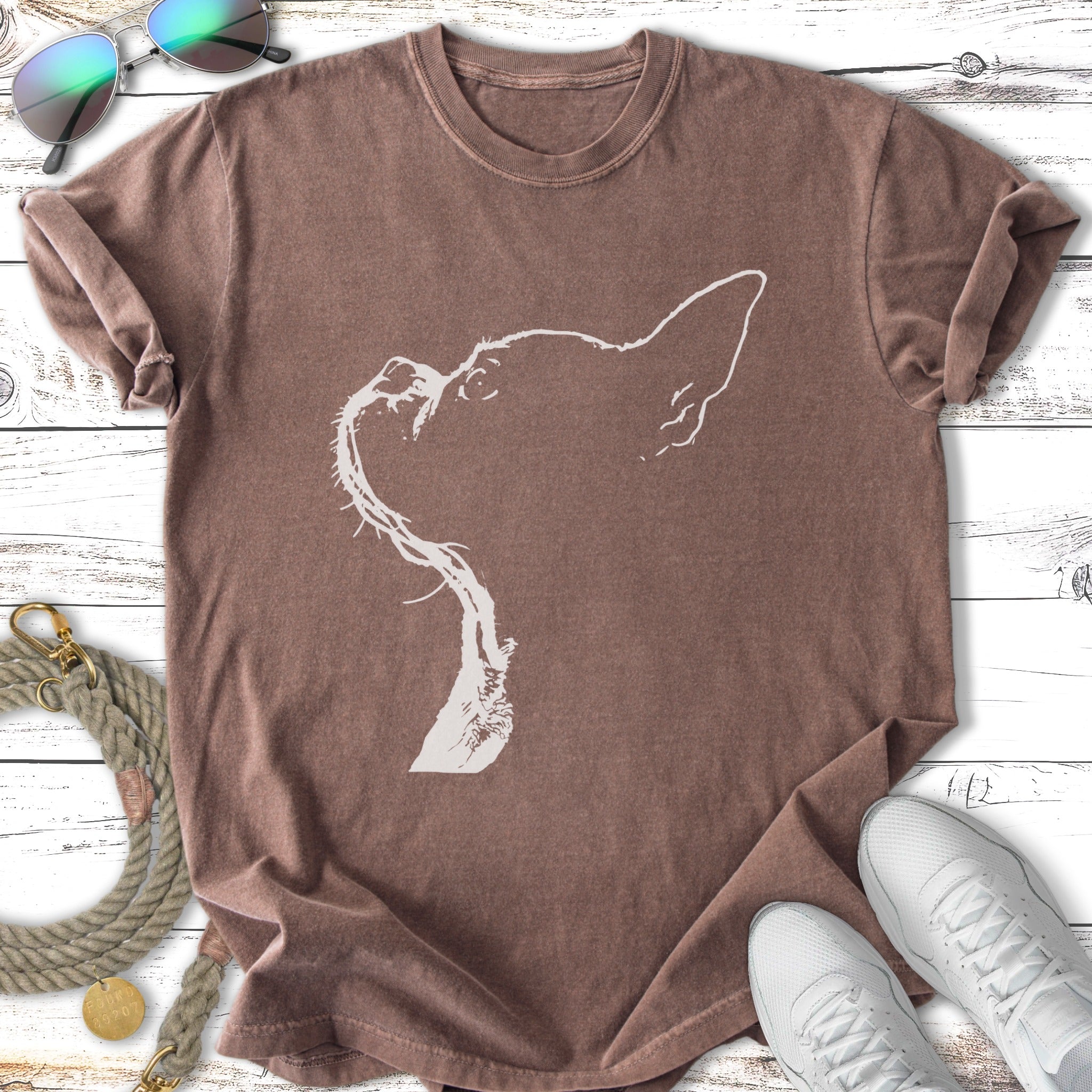 Brown t-shirt with a white outline graphic of a dog's head and leash.