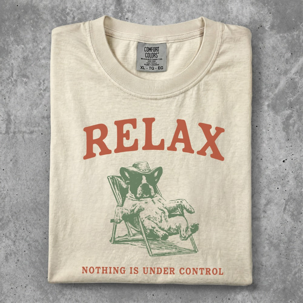 Cream t-shirt with "RELAX" and a dog lounging in a chair.