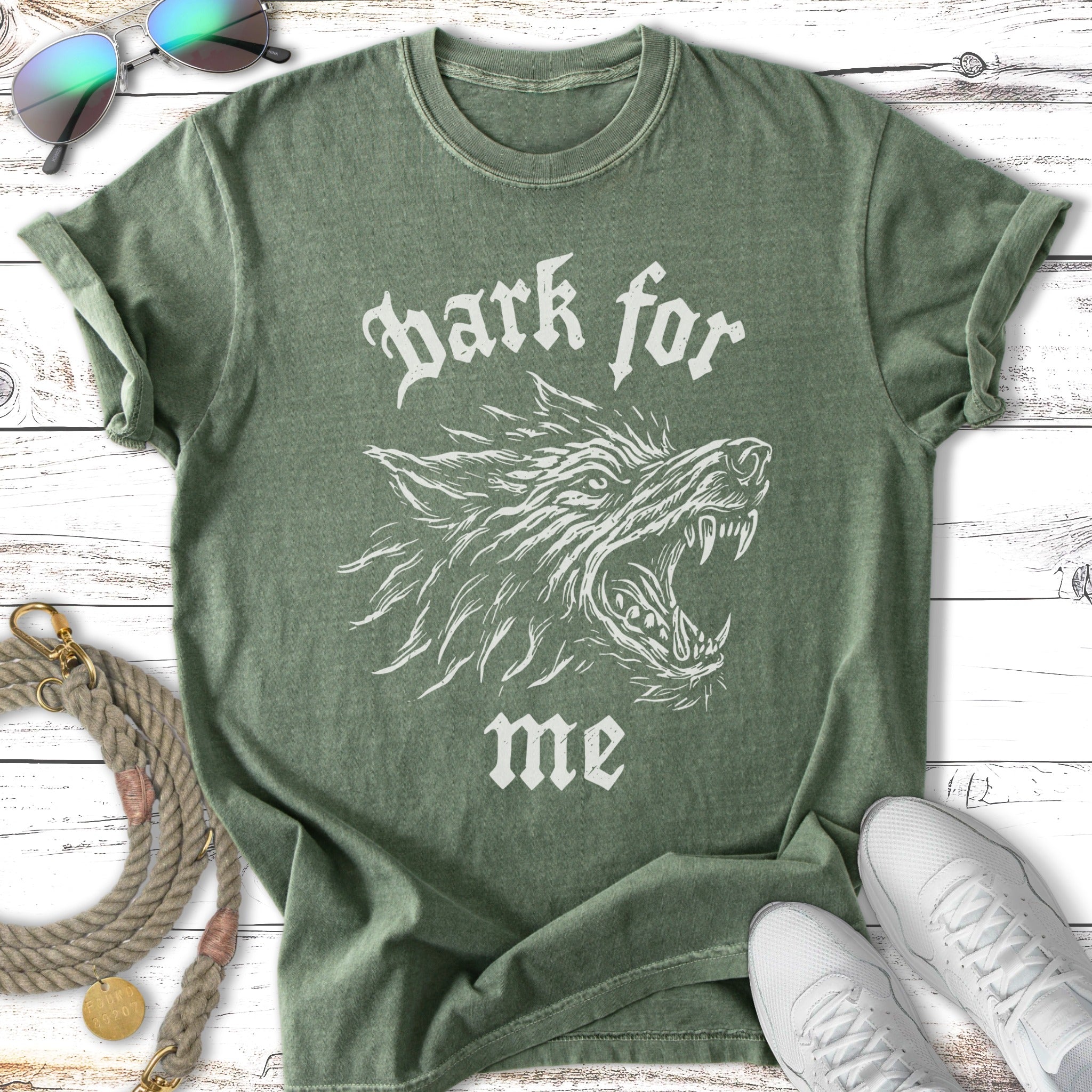 Green t-shirt with white graphic of a wolf's head and "bark for me" text.