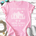 Pink t-shirt with "If It Involves Hiking & Dogs, Count Me In" text and mountain graphic.