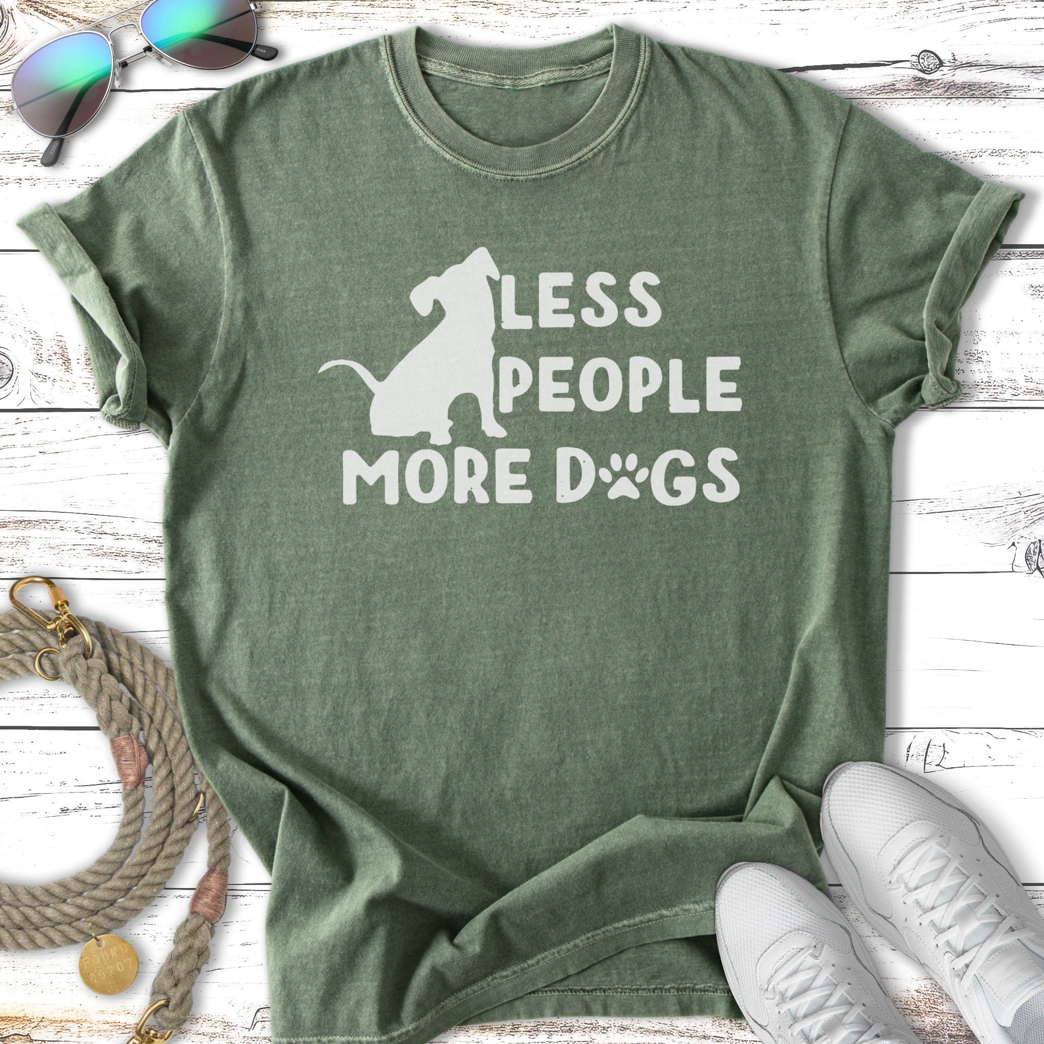 Green t-shirt with "LESS PEOPLE MORE DOGS" text and dog silhouette.
