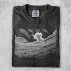 Black t-shirt with a poodle peeking over a log.