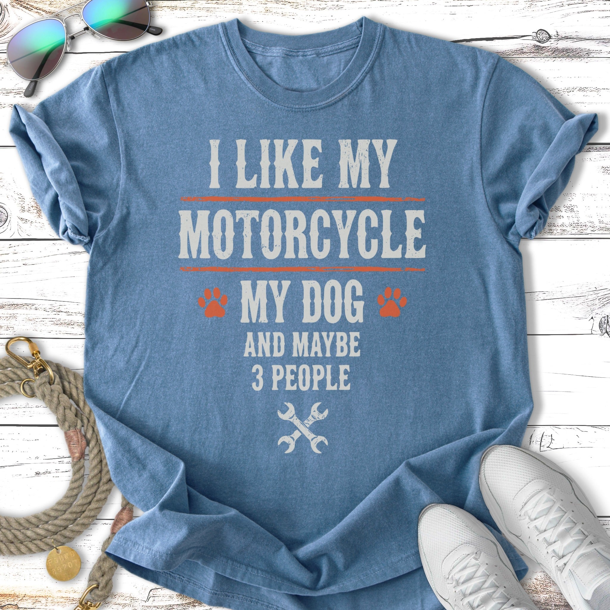 Blue t-shirt with text "I like my motorcycle my dog and maybe 3 people".