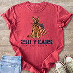 German Shepherd holding American flag with text "250 YEARS 1776-2026".
