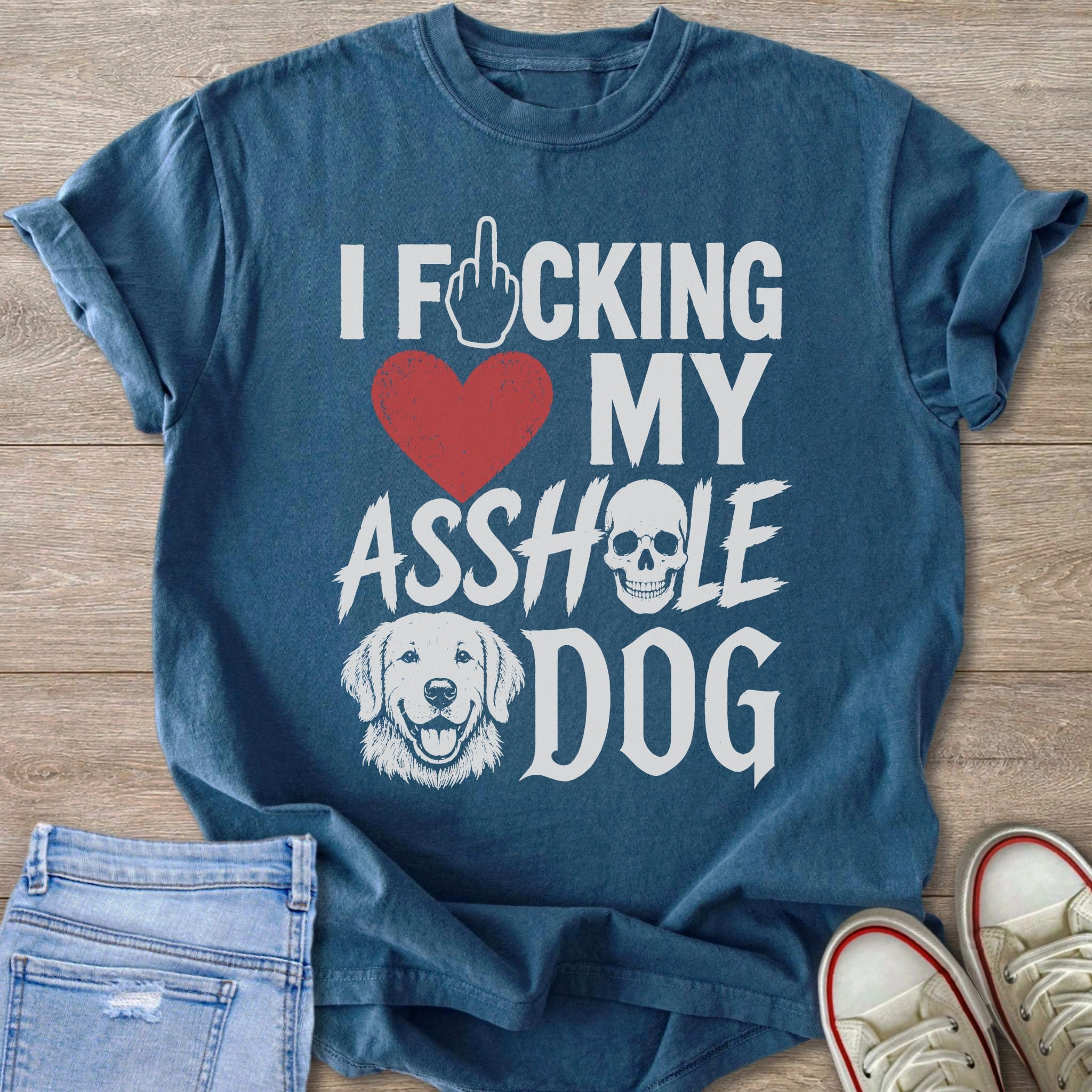 Blue t-shirt with text "I ____ing My Asshole Dog" and dog illustration.