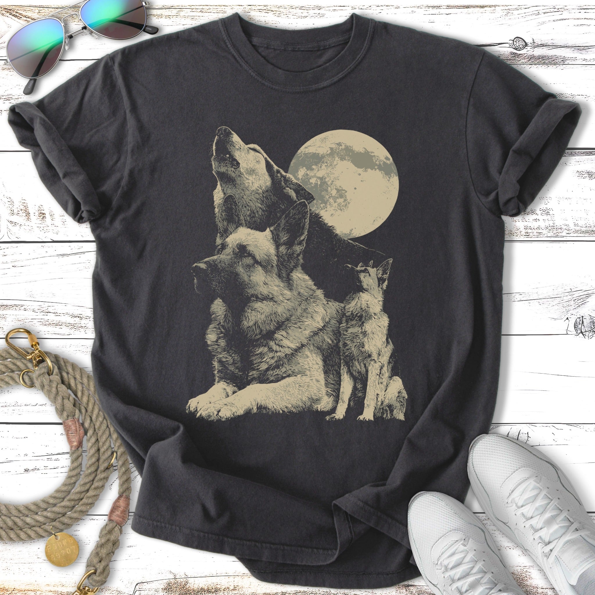Black t-shirt with wolf and dog silhouettes against a moon.