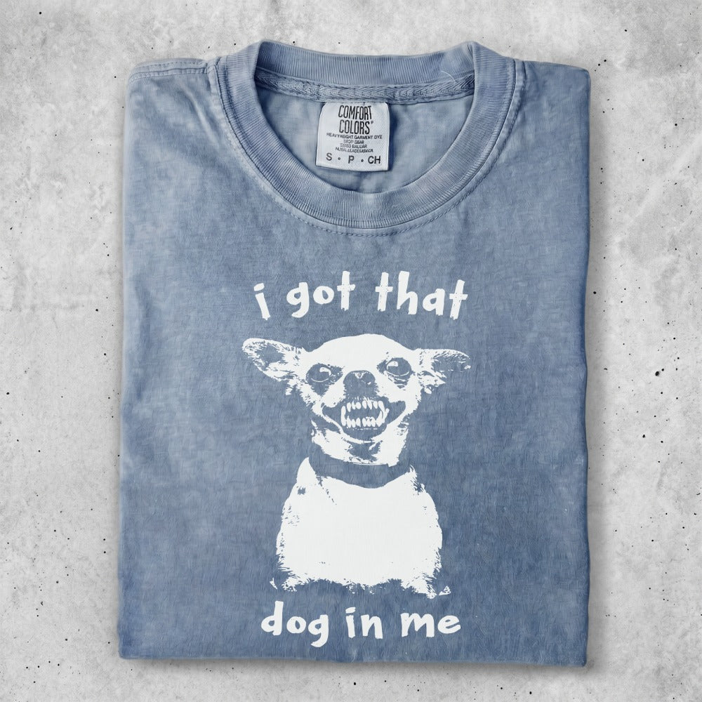 Blue t-shirt with white graphic of a snarling dog and text "i got that dog in me".