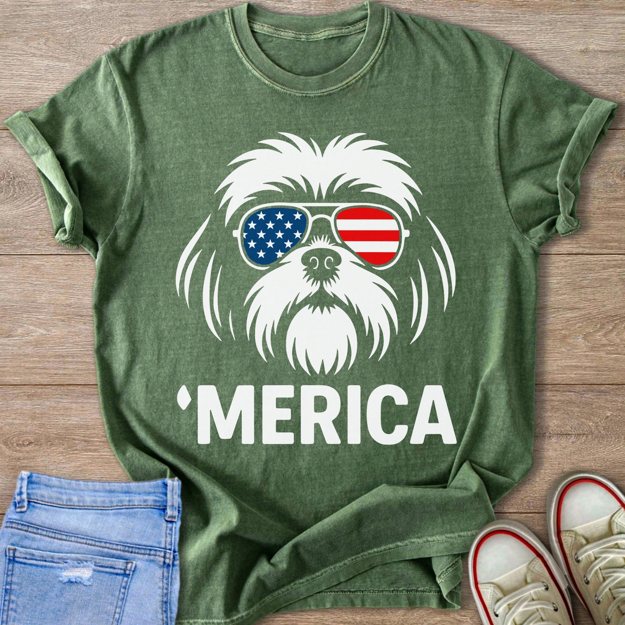 Green t-shirt with white dog graphic wearing sunglasses and text 'MERICA.