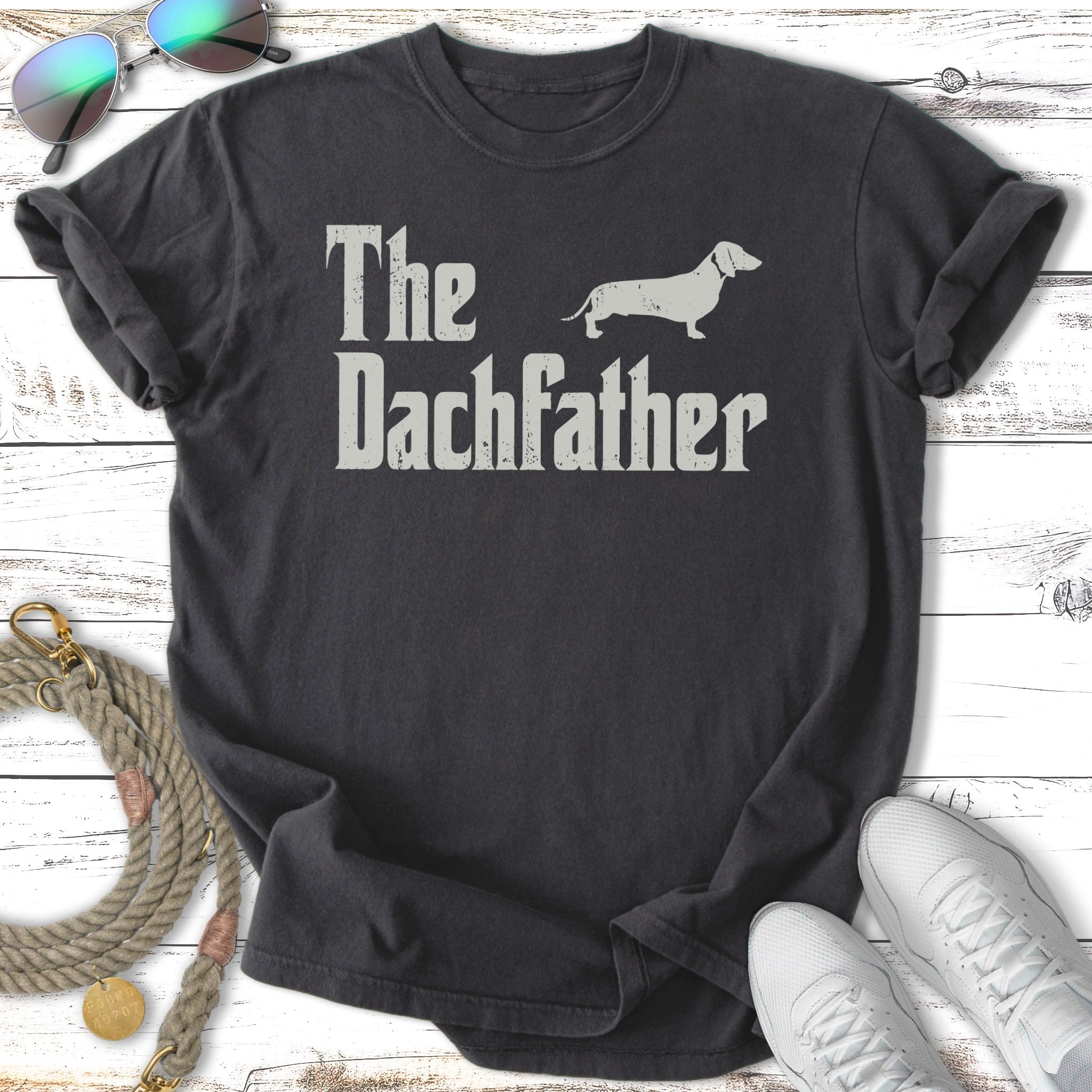 Dark t-shirt with "The DachFather" and dachshund silhouette graphic.