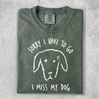 Green t-shirt with "Sorry I Have To Go I Miss My Dog" and dog graphic.