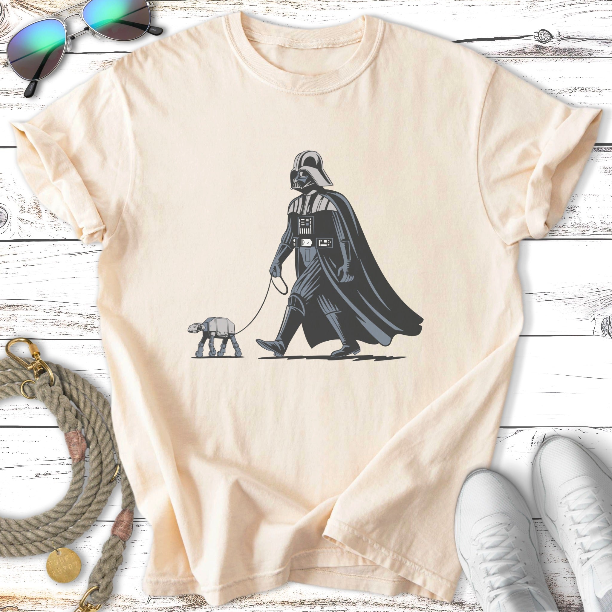 Darth Vader walking an AT-ST on a leash.
