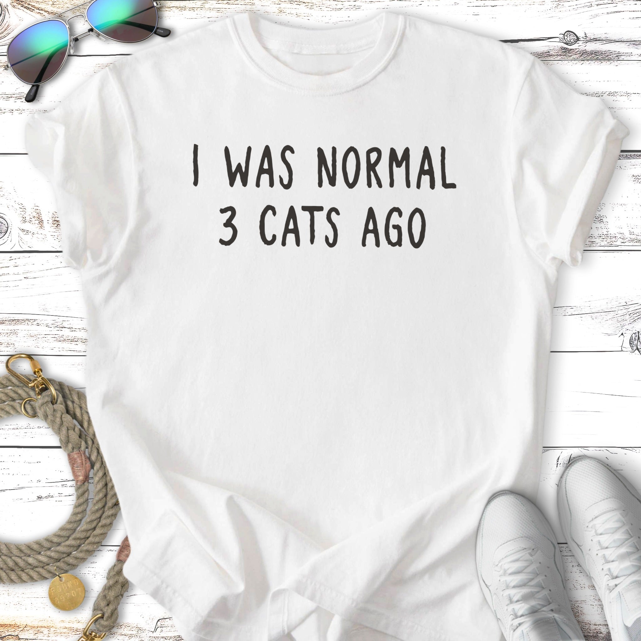White t-shirt with black text "I WAS NORMAL 3 CATS AGO".