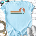 Light blue t-shirt with distressed retro sunset and French bulldog silhouette.