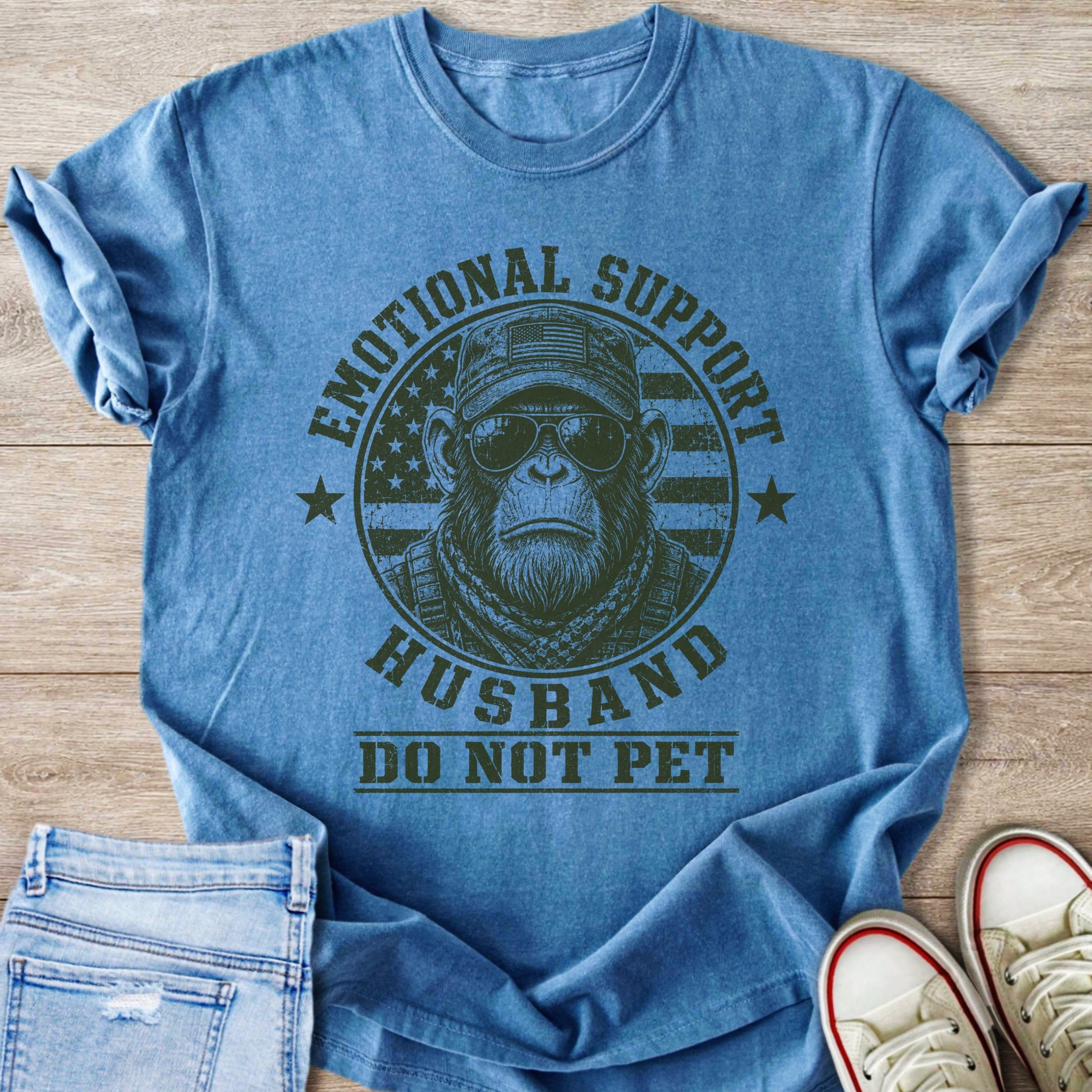 T-shirt with chimpanzee, sunglasses, cap, and text "EMOTIONAL SUPPORT HUSBAND DO NOT PET".