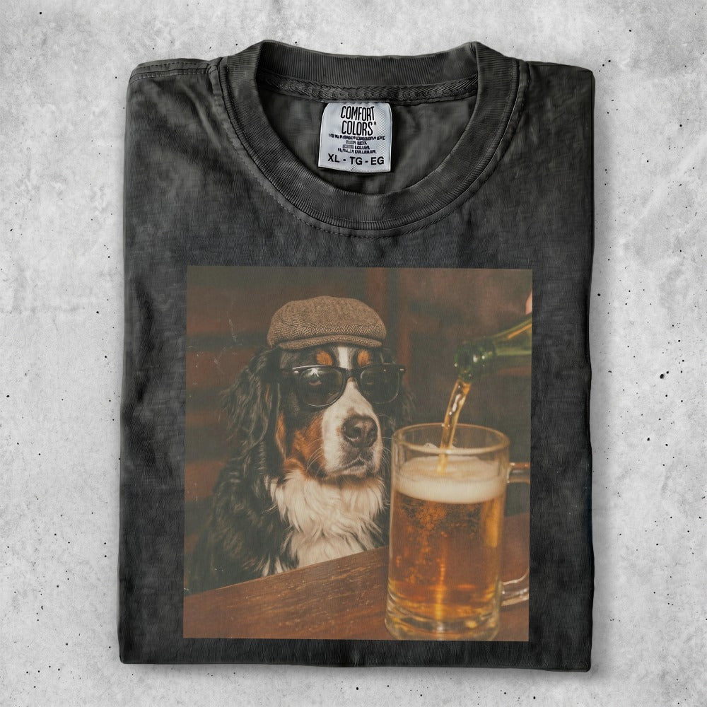 Bernese Mountain Dog wearing sunglasses and hat, pouring beer into mug.