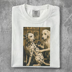 Tattooed Dalmatian receiving a tattoo from another Dalmatian on a white t-shirt.