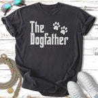 Dark t-shirt with white text "The Dogfather" and two paw prints.