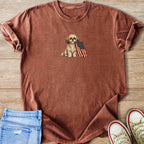 Brown t-shirt with graphic of a dog holding an American flag in its mouth.