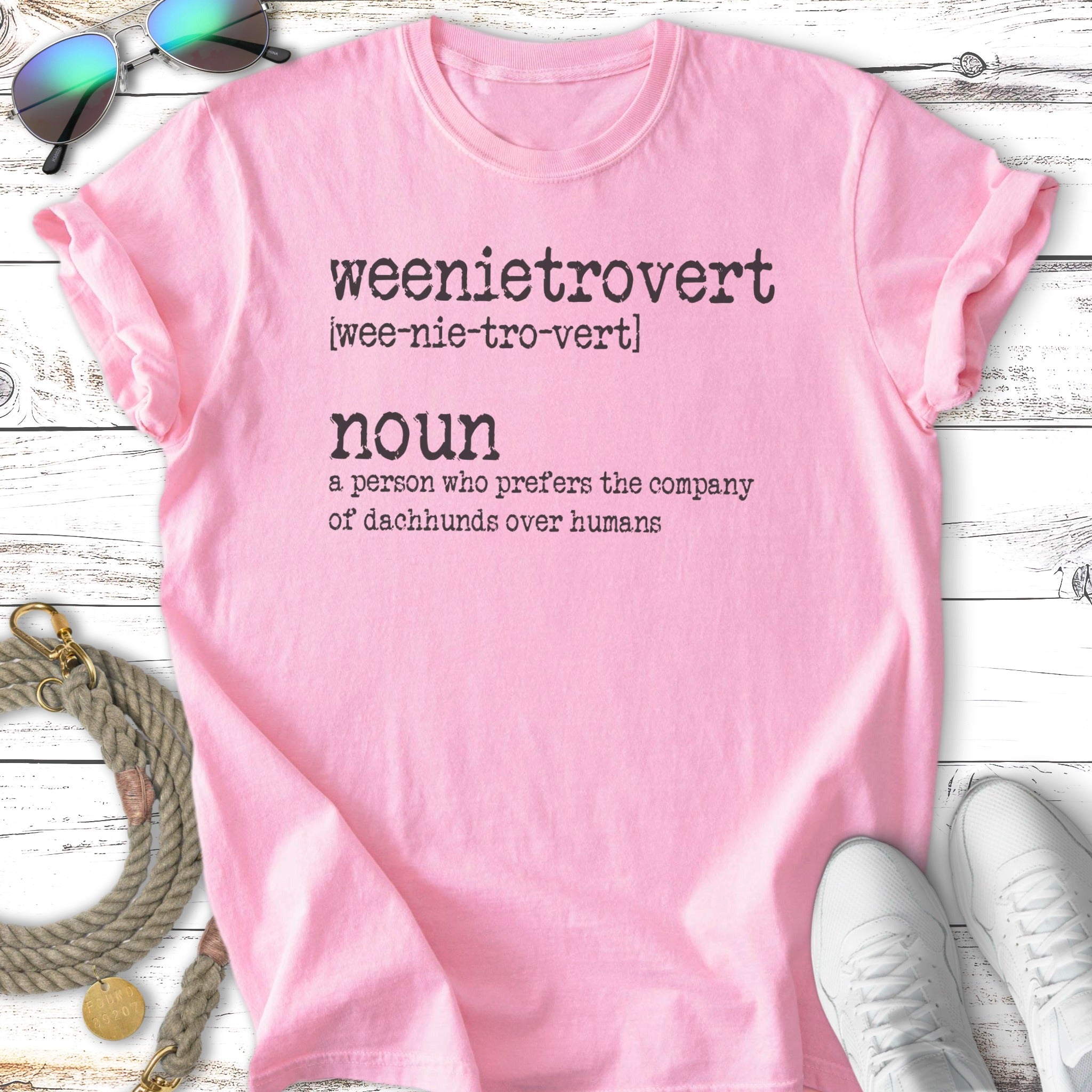 Pink t-shirt with "weenietrovert" definition and illustration of a dachshund.
